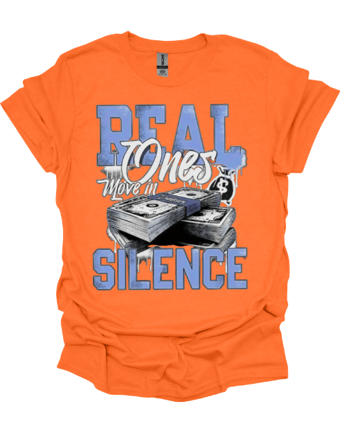 Orange t-shirt with money graphic and text 'Real Ones Move in Silence' on a black background