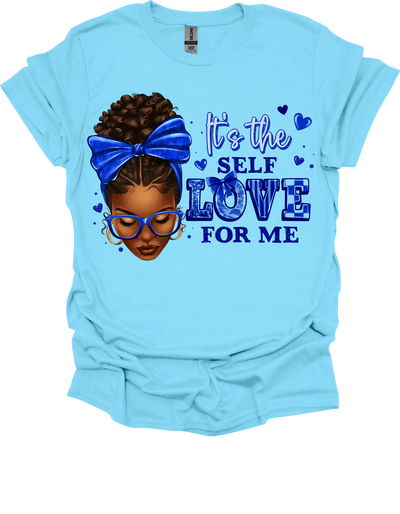Light blue t-shirt with a graphic of a girl with a blue bow and text 'It's the self love for me' on a black background.