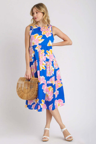 Model in floral tiered midi tank dress