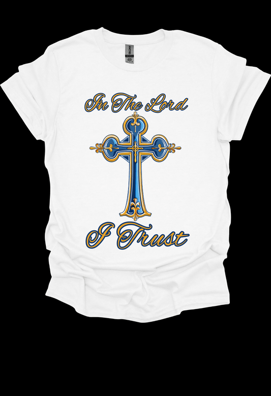White t-shirt with a blue and gold cross design and text 'In The Lord I Trust' on a white background